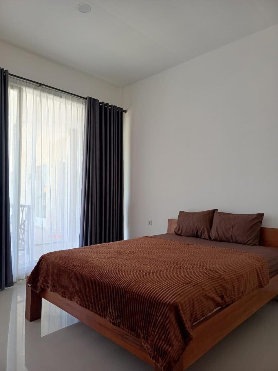 Zavana Rooms & Restaurant Tanjungkarang Esterno foto